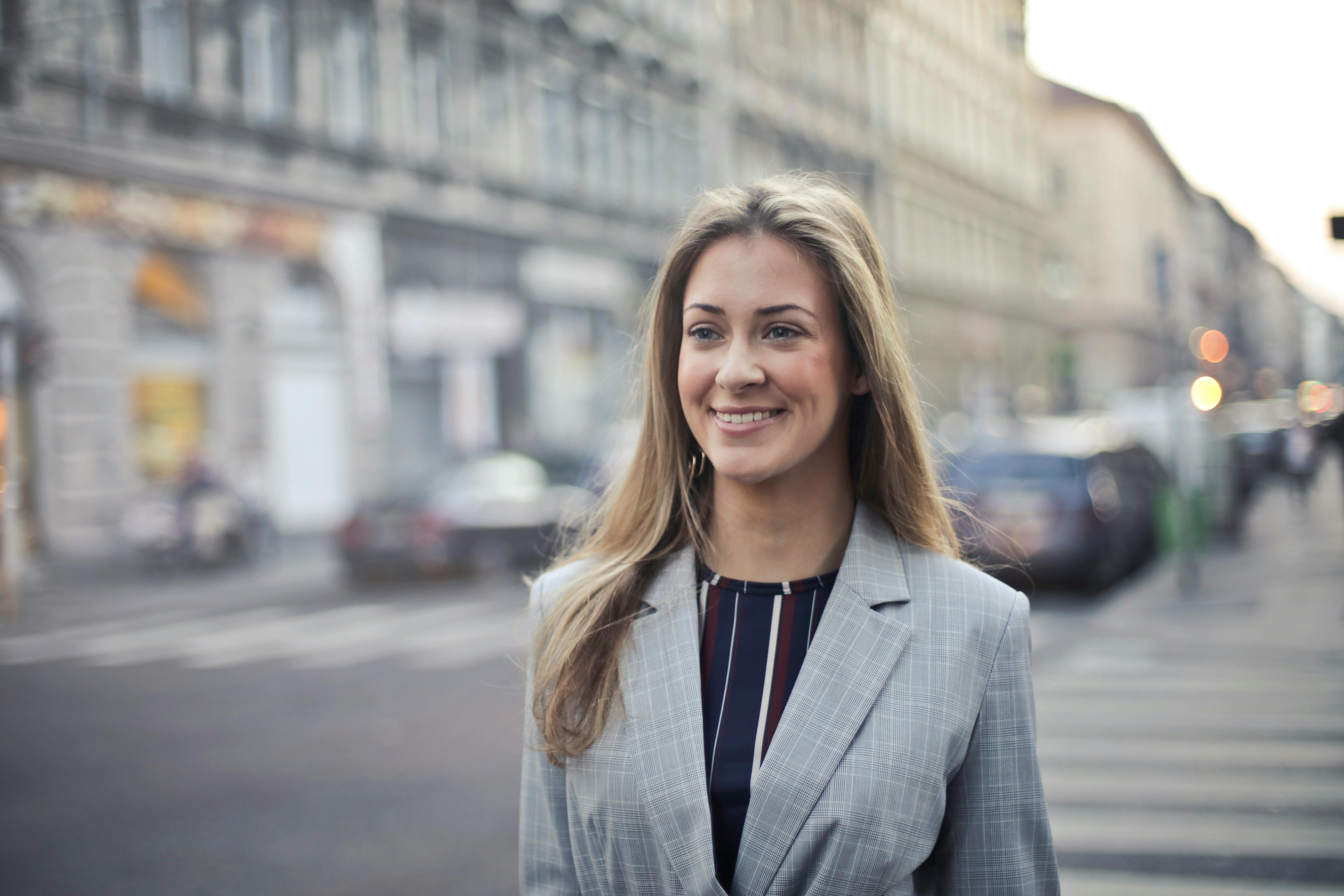 A woman smiling | Source: Pexels
