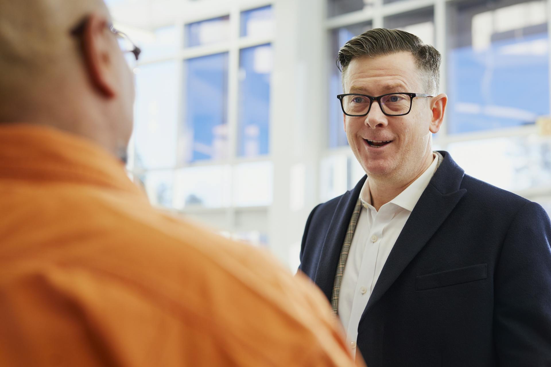 Two men talking | Source: Pexels