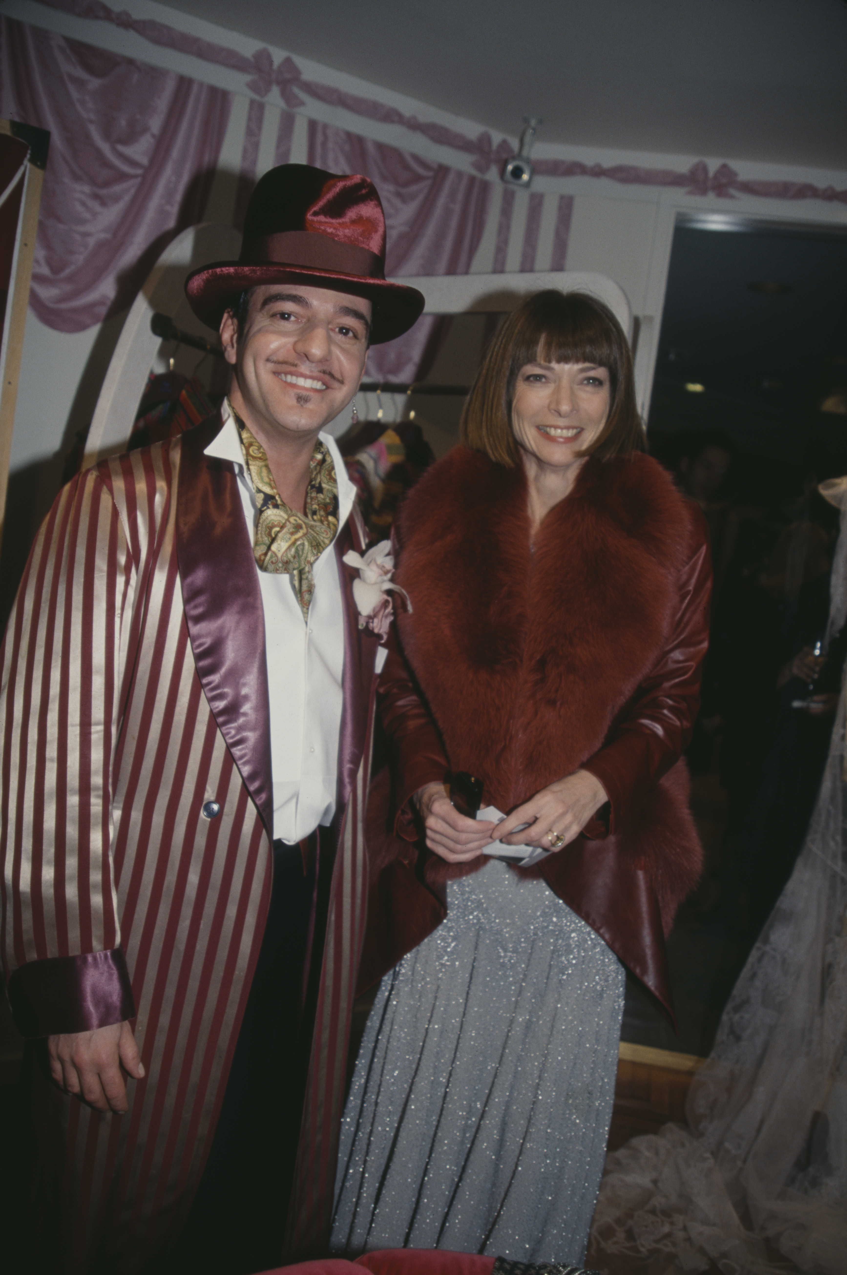 John Galliano and Anna Wintour attend a party at Bergdorf Goodman in New York City, circa 1998. | Source: Getty Images