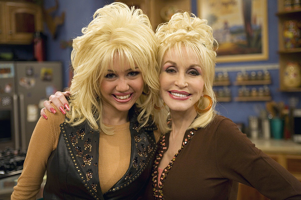 Miley Cyrus and Dolly Parton during the season two episode, "I Will Always Loathe You," on "Hannah Montana." | Source: Getty Images