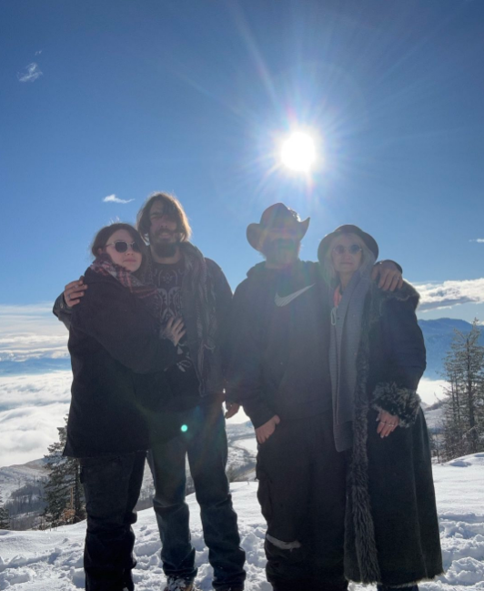 Rain Brown, Josiah Brown, DJ, and Ami Brown pose together on a snow-capped mountain on January 18, 2026 | Source: Instagram/amibrownwolfpackmama
