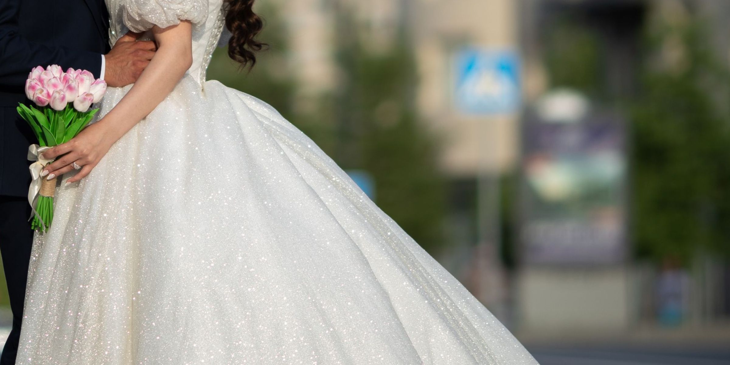Close-up shot of a bride and groom standing outdoors | Source: Pexels
