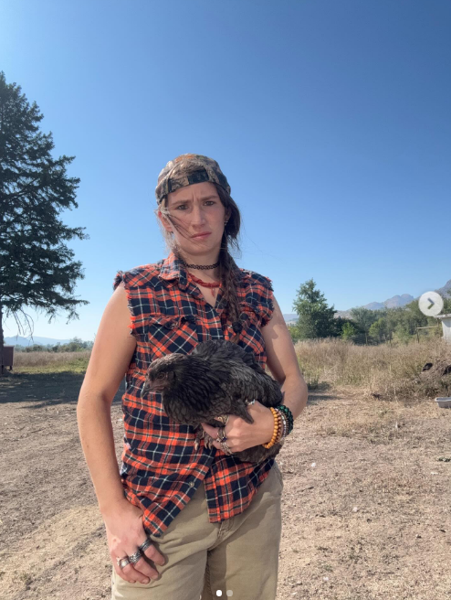 Snowbird Brown poses for an outdoor selfie with a chicken on January 19, 2026 | Source: Instagram/snowbird907brown