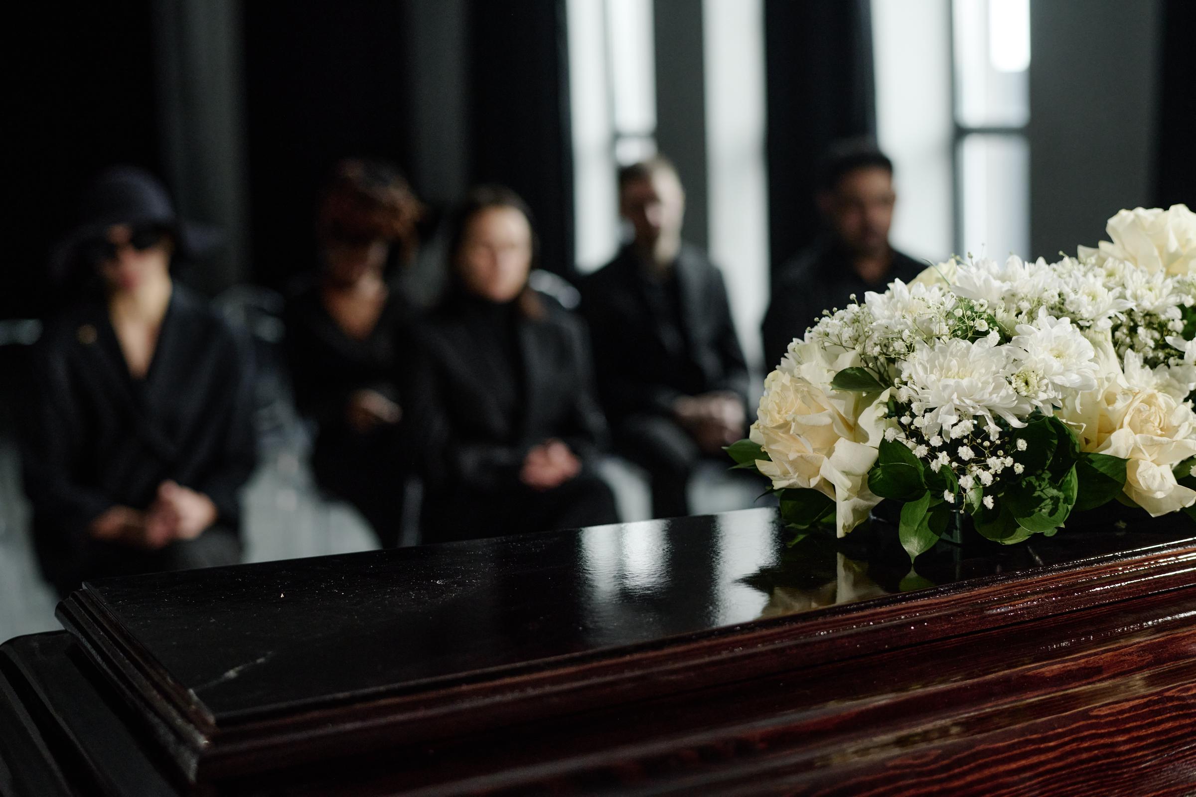 People at a funeral | Source: Shutterstock