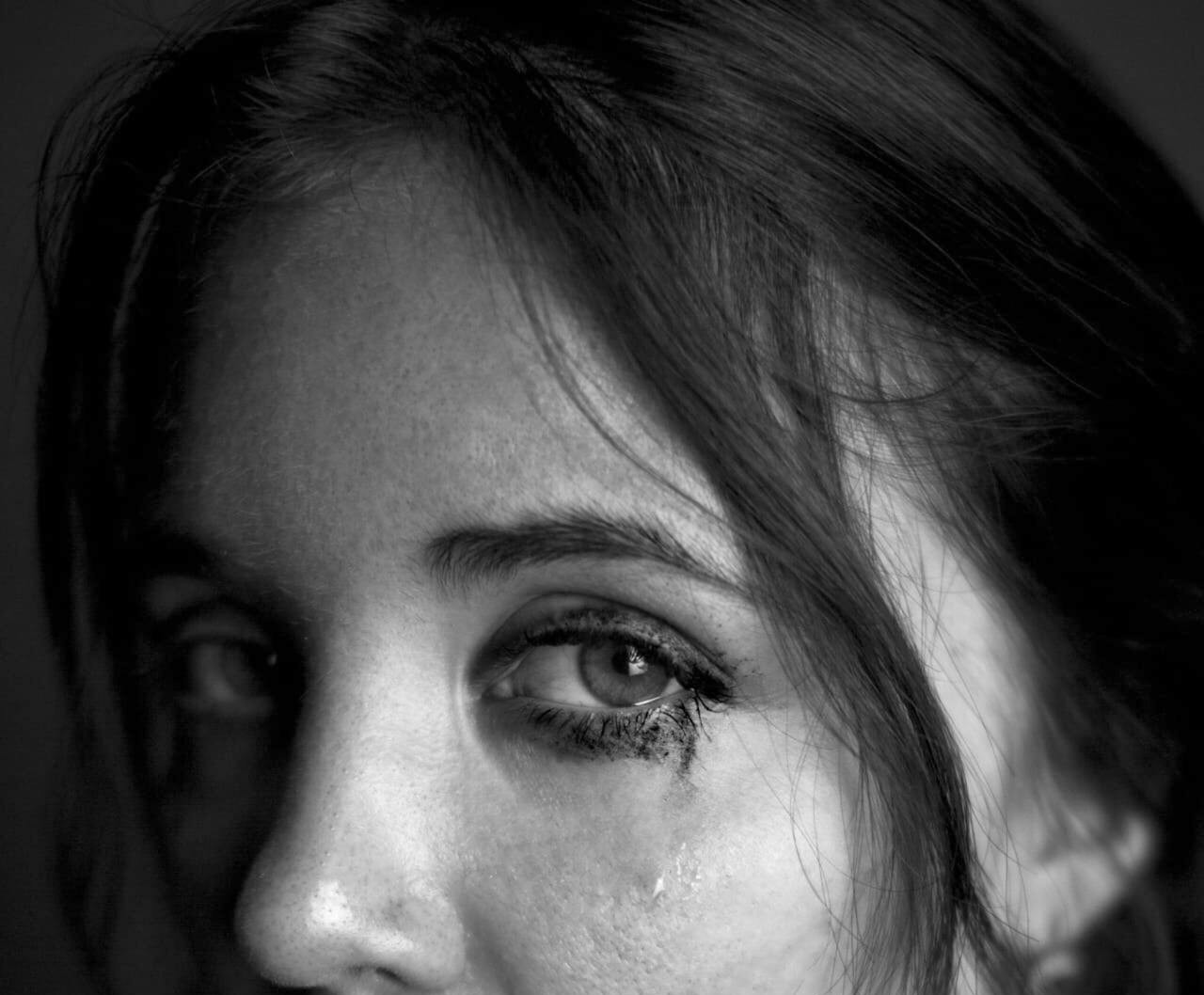 Close-up cropped shot of a teary-eyed woman | Source: Pexels