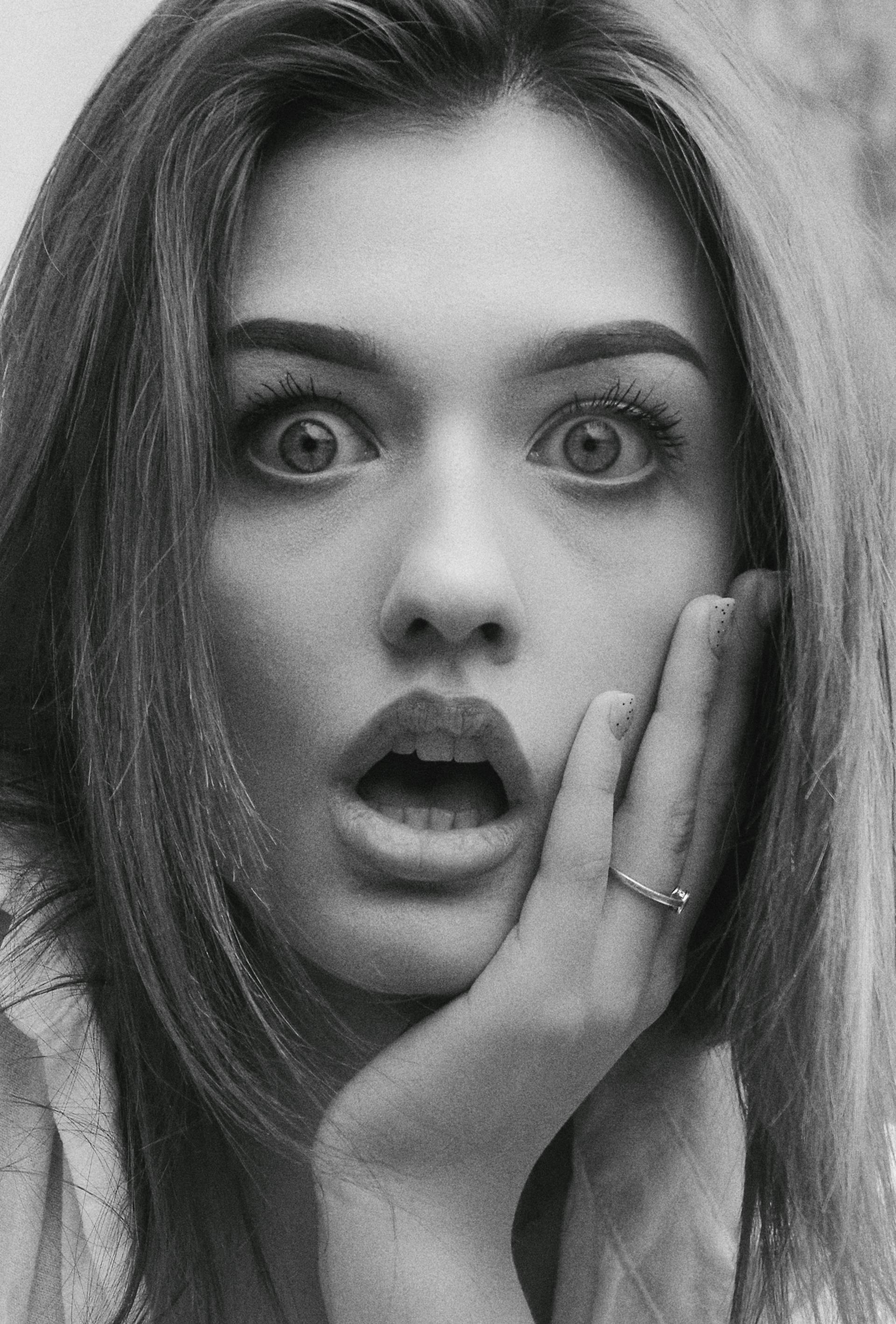 A woman gasping | Source: Pexels