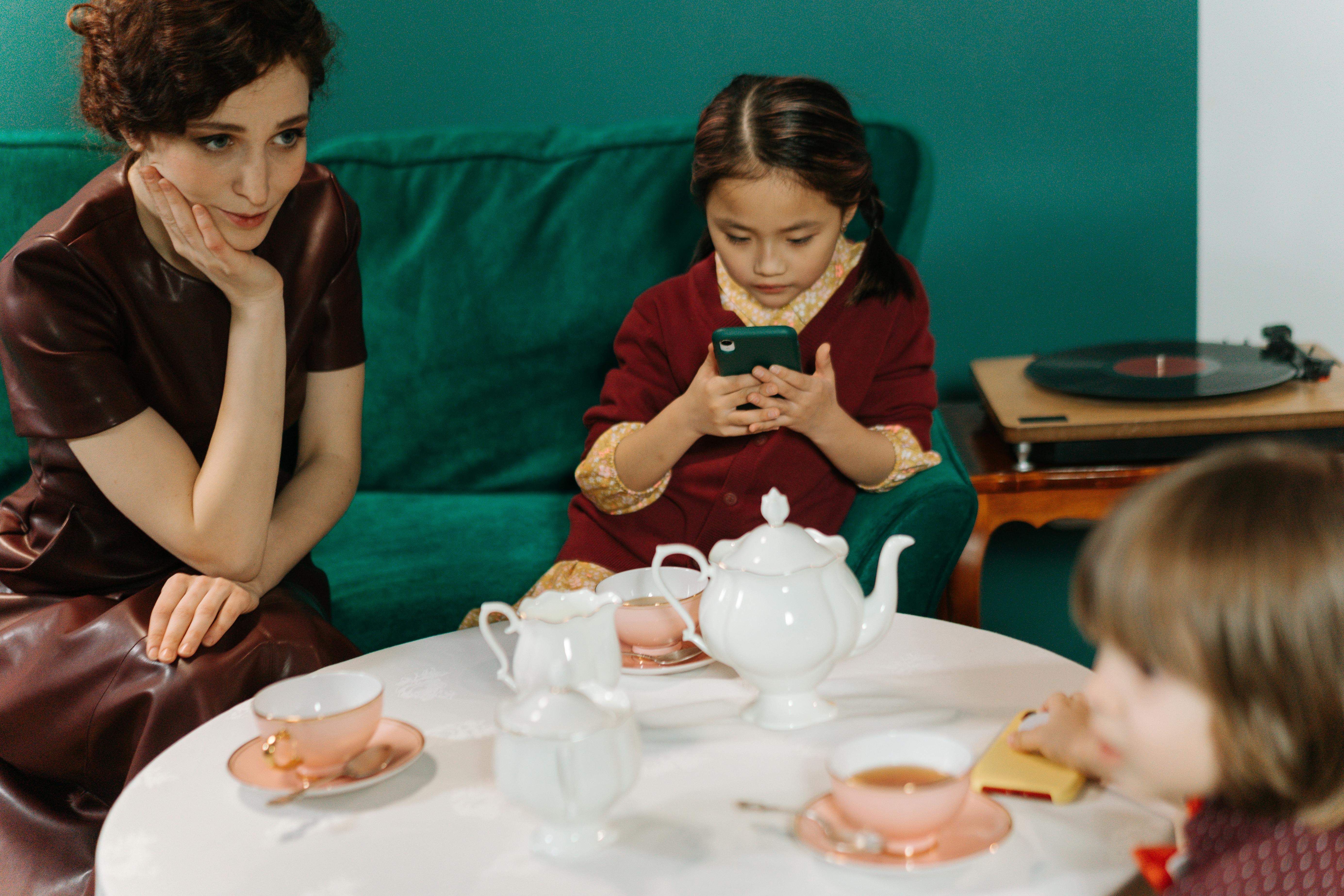 Nanny watching over kids | Source: Pexels