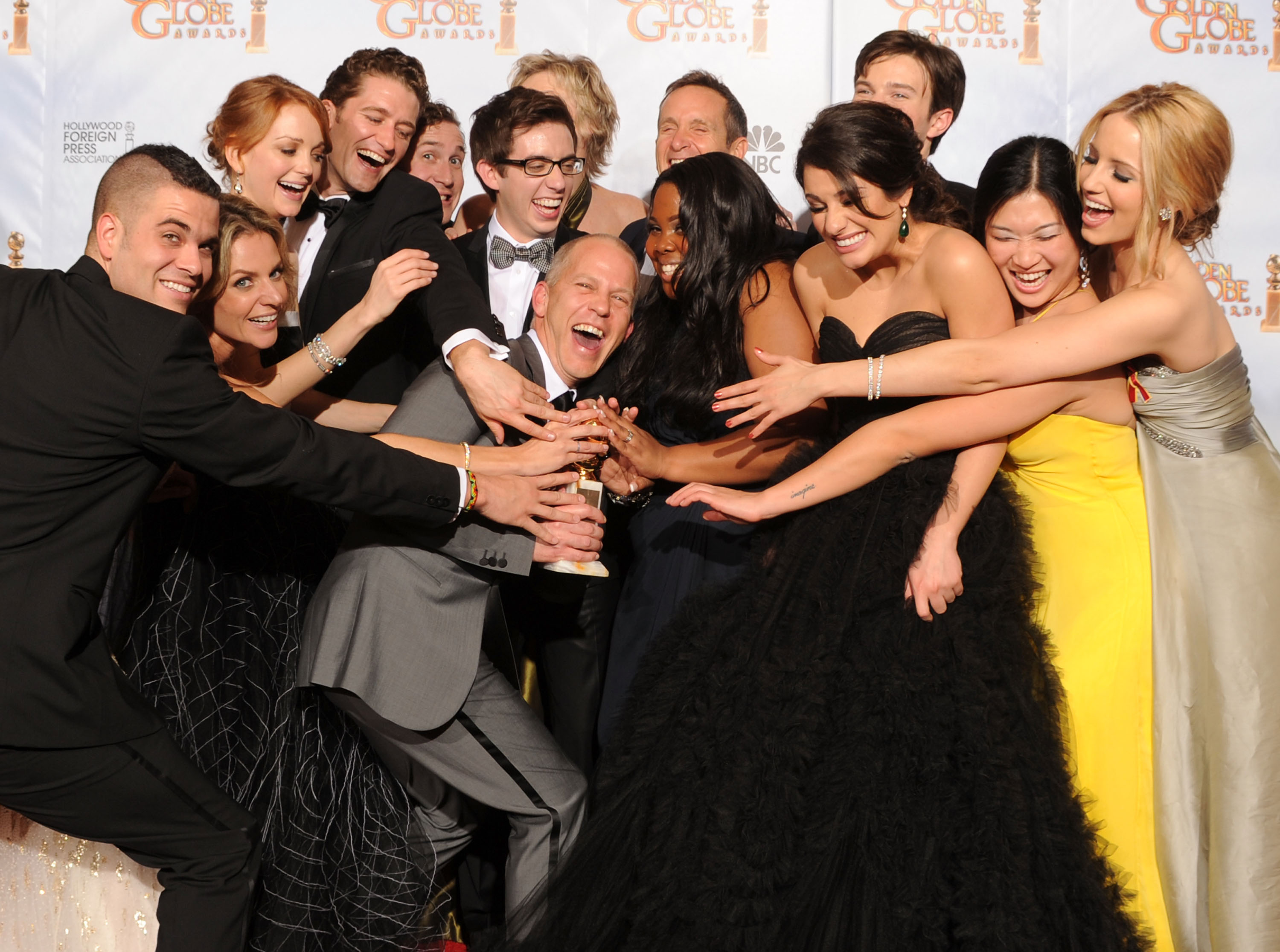Ryan Murphy with the original cast members of "Glee" in the press room after the show won Best Television Series Musical or Comedy at the 67th Annual Golden Globe Awards on January 17, 2010 | Source: Getty Images
