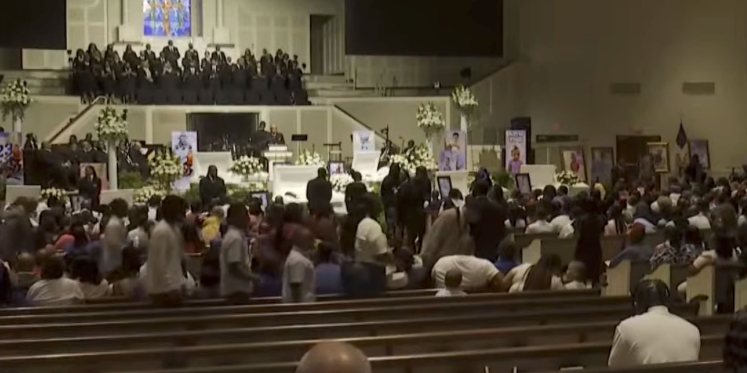 A screengrab of the service remembering the eight children killed in a mass shooting | Source: YouTube/KSLA News 12