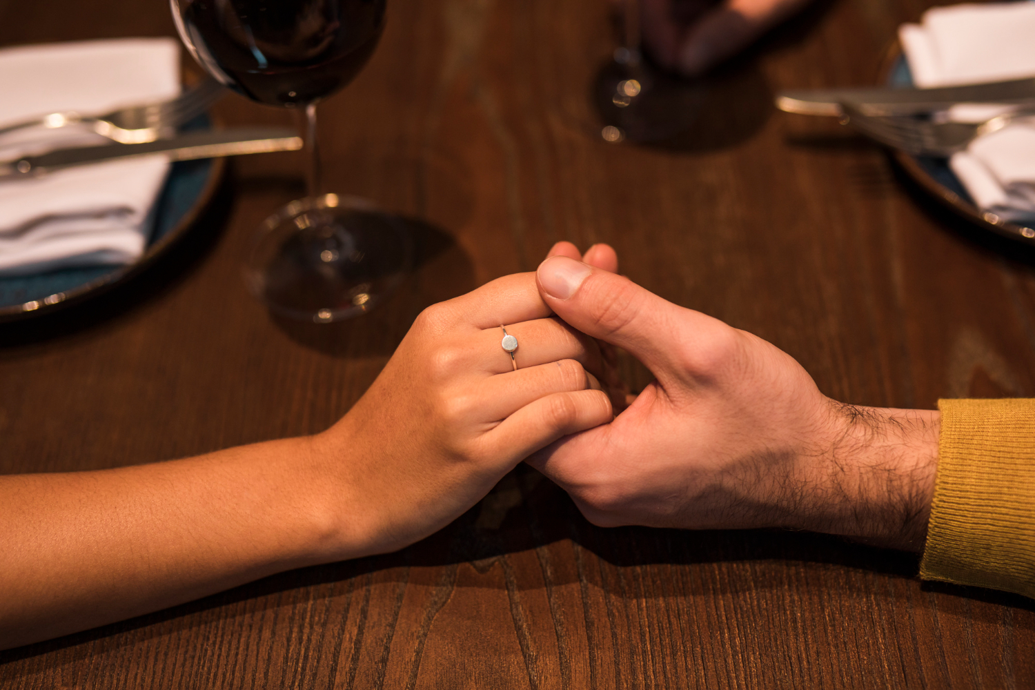 Close-up shot of a couple holding hands | Source: Freepik