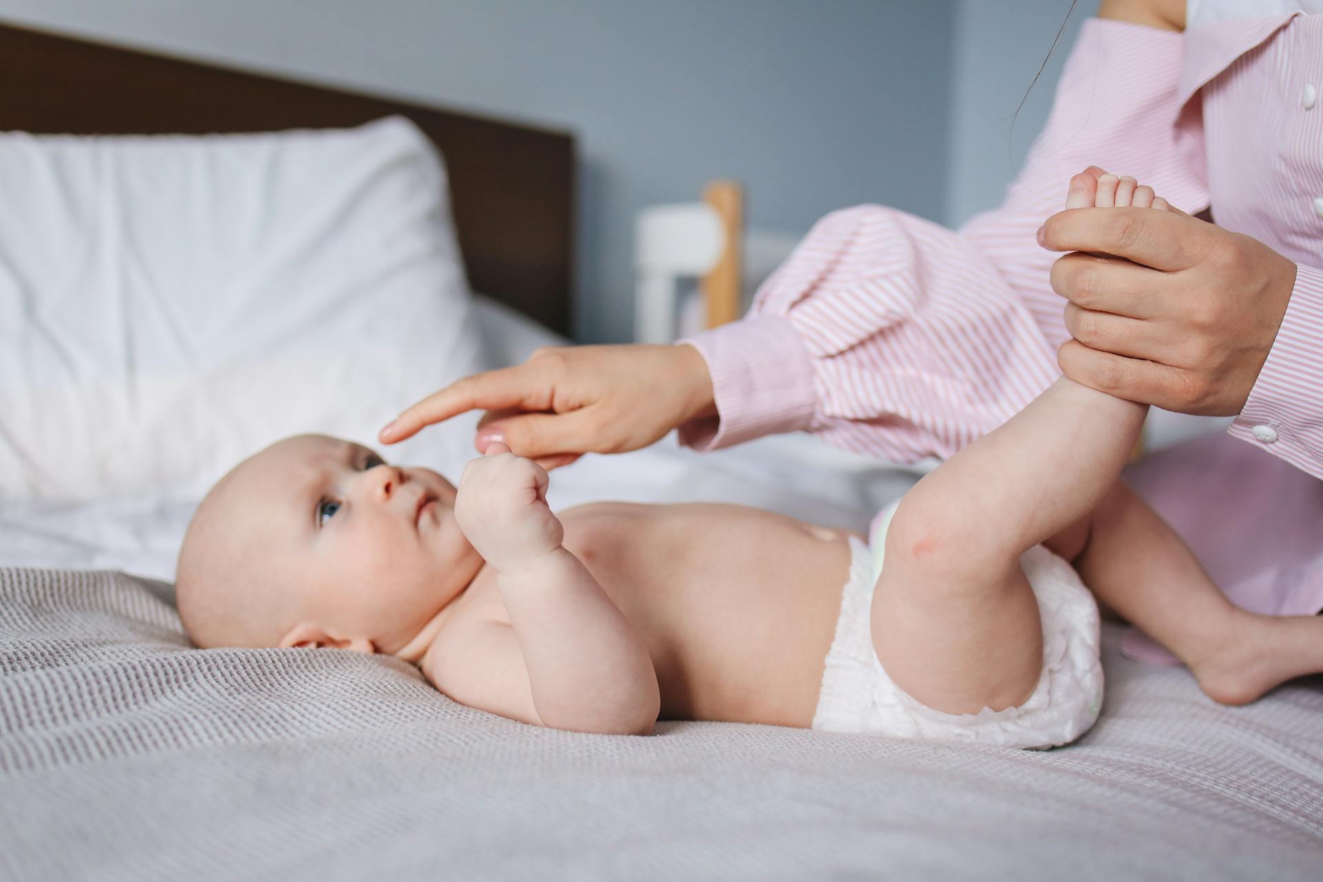 A nanny looking after a baby | Source: Pexels