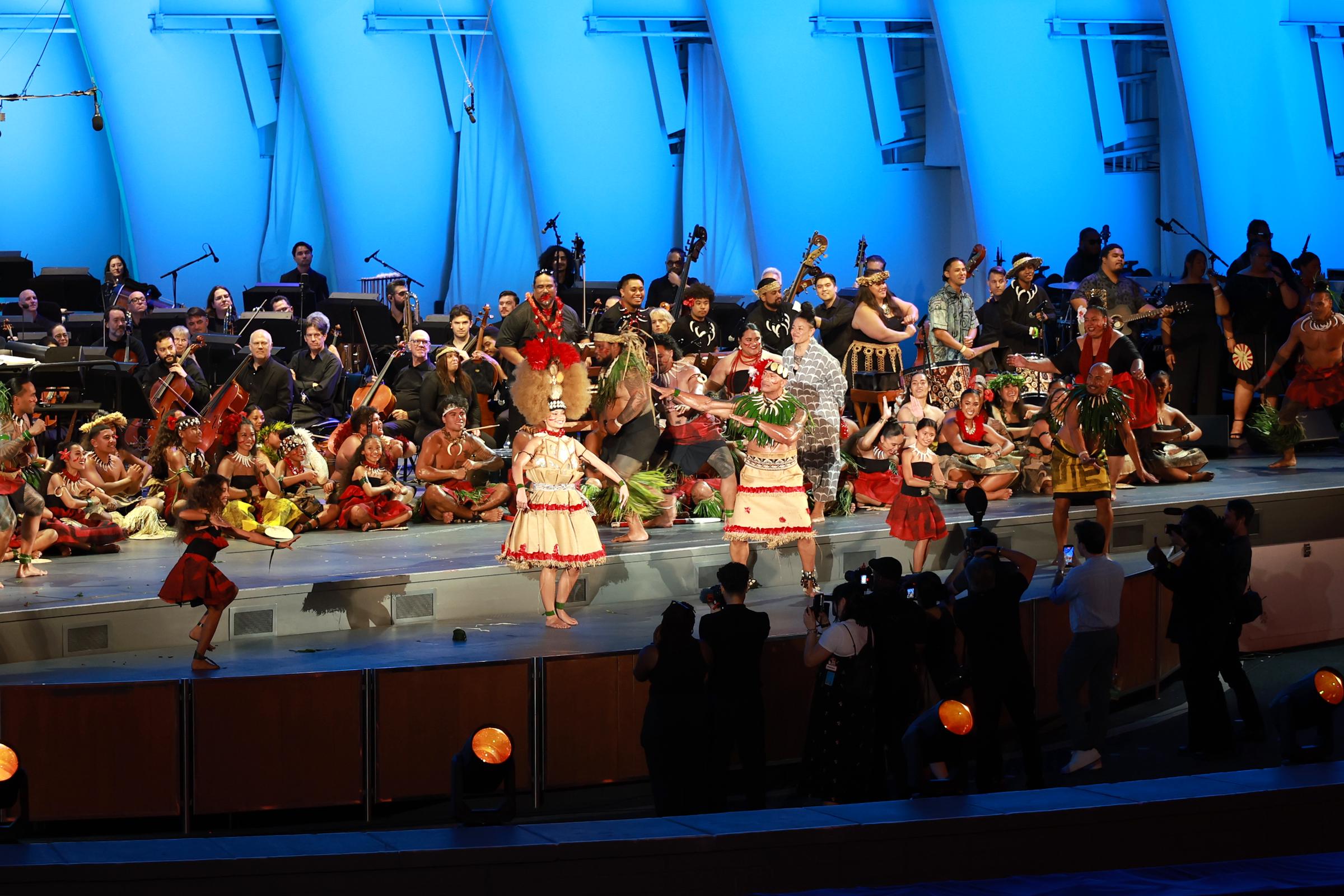 Catherine Laga'aia and Dwayne Johnson perform onstage during the "Moana" World Premiere at the Hollywood Bowl on July 7, 2026 in Los Angeles, California. | Source: Getty Images