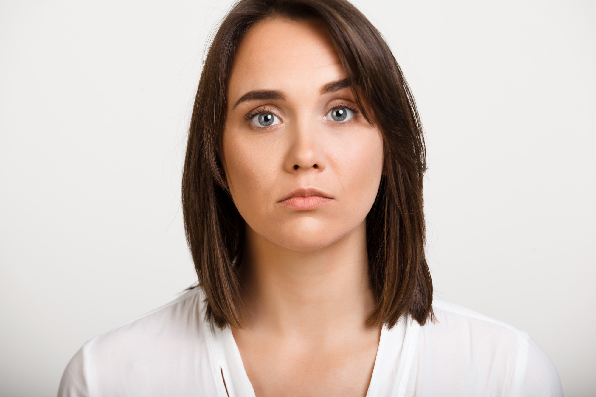 A woman looking straight ahead | Source: Freepik
