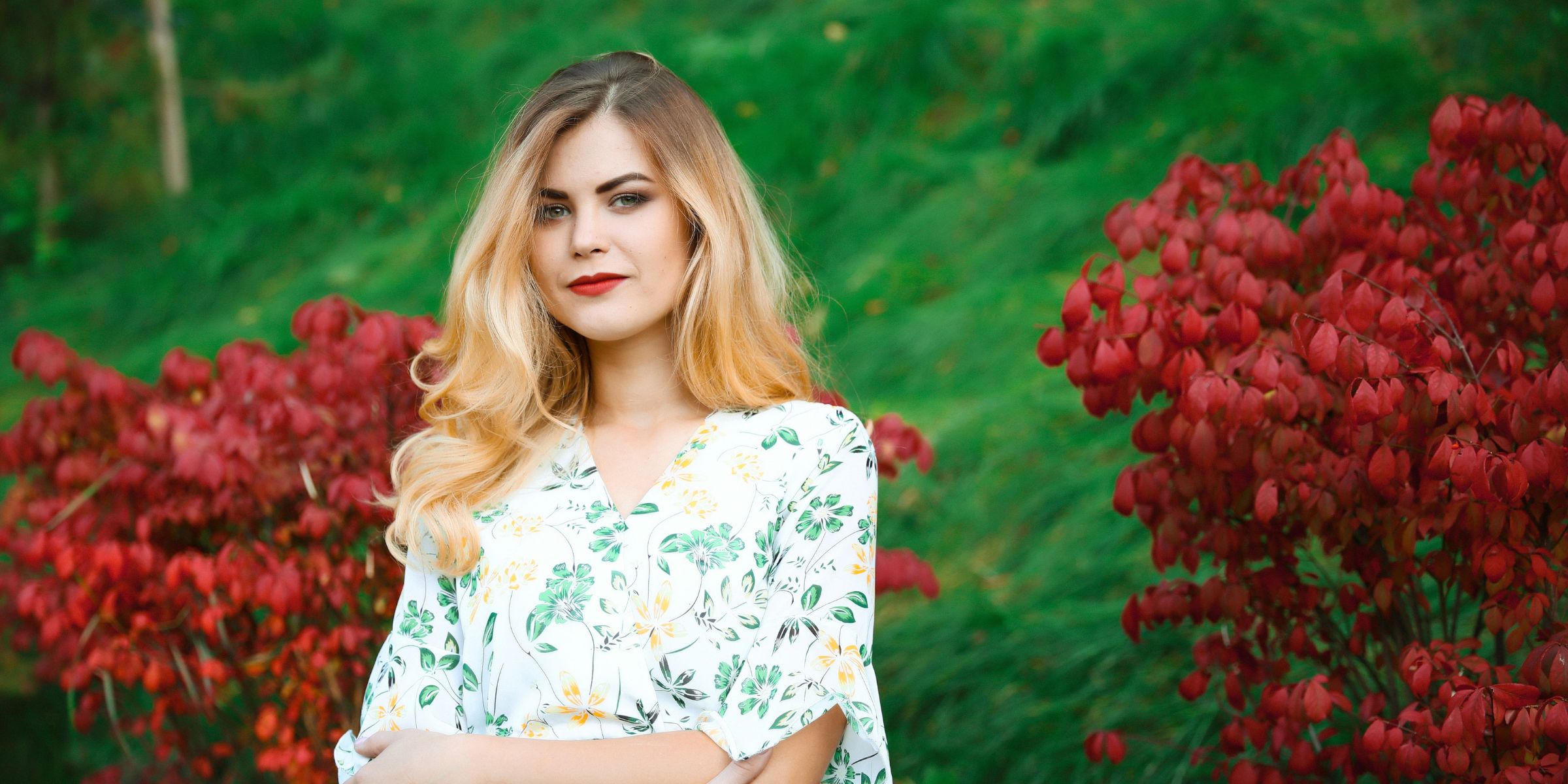 A beautiful woman standing confidently in a garden | Source: Pexels