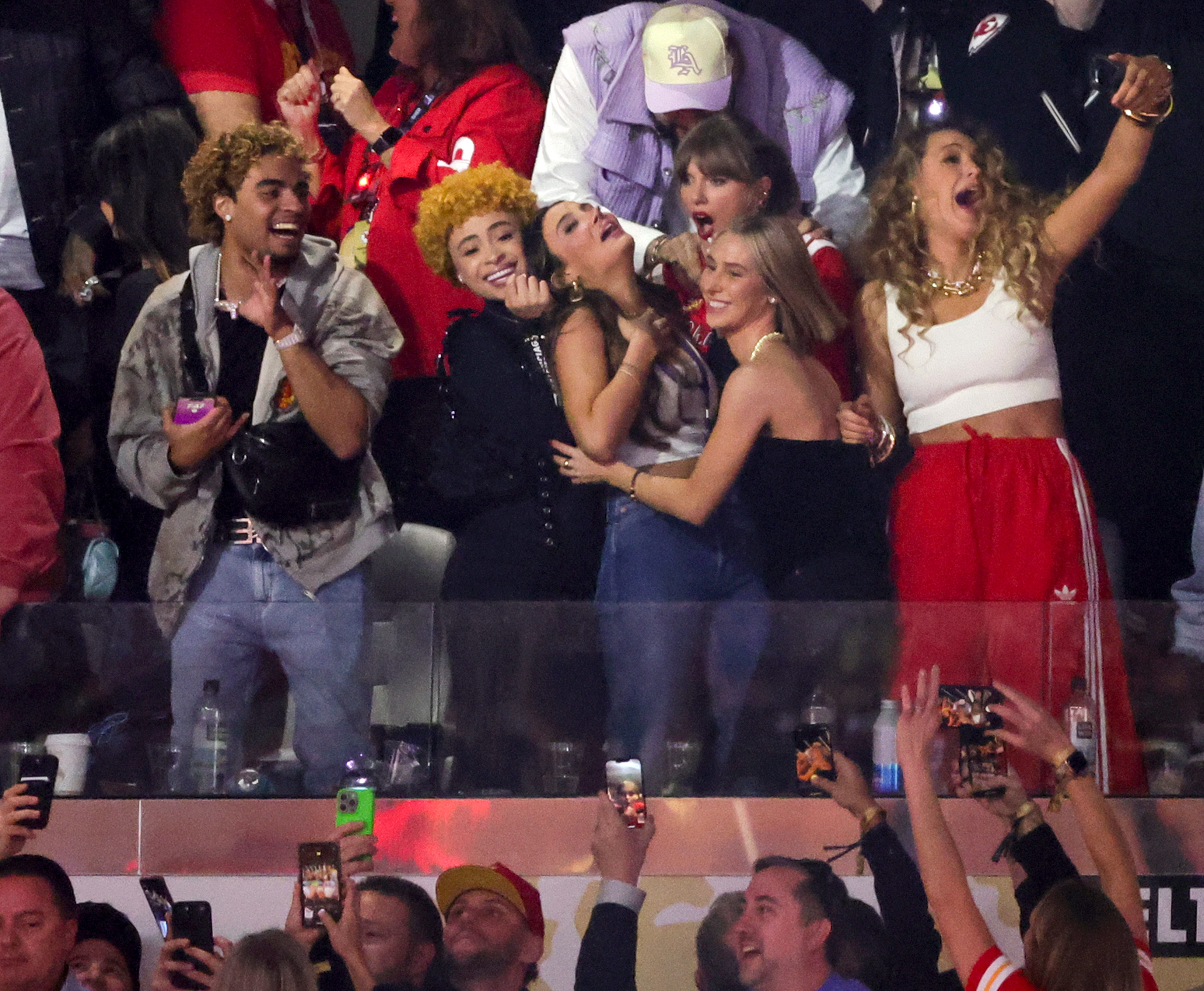 (L-R) RIOTUSA, Ice Spice, Keleigh Teller, Taylor Swift, Ashley Avignone and Blake Lively celebrate after the Kansas City Chiefs defeated the San Francisco 49ers 25-22 in overtime of Super Bowl LVIII at Allegiant Stadium on February 11, 2024 in Las Vegas, Nevada. | Source: Getty Images