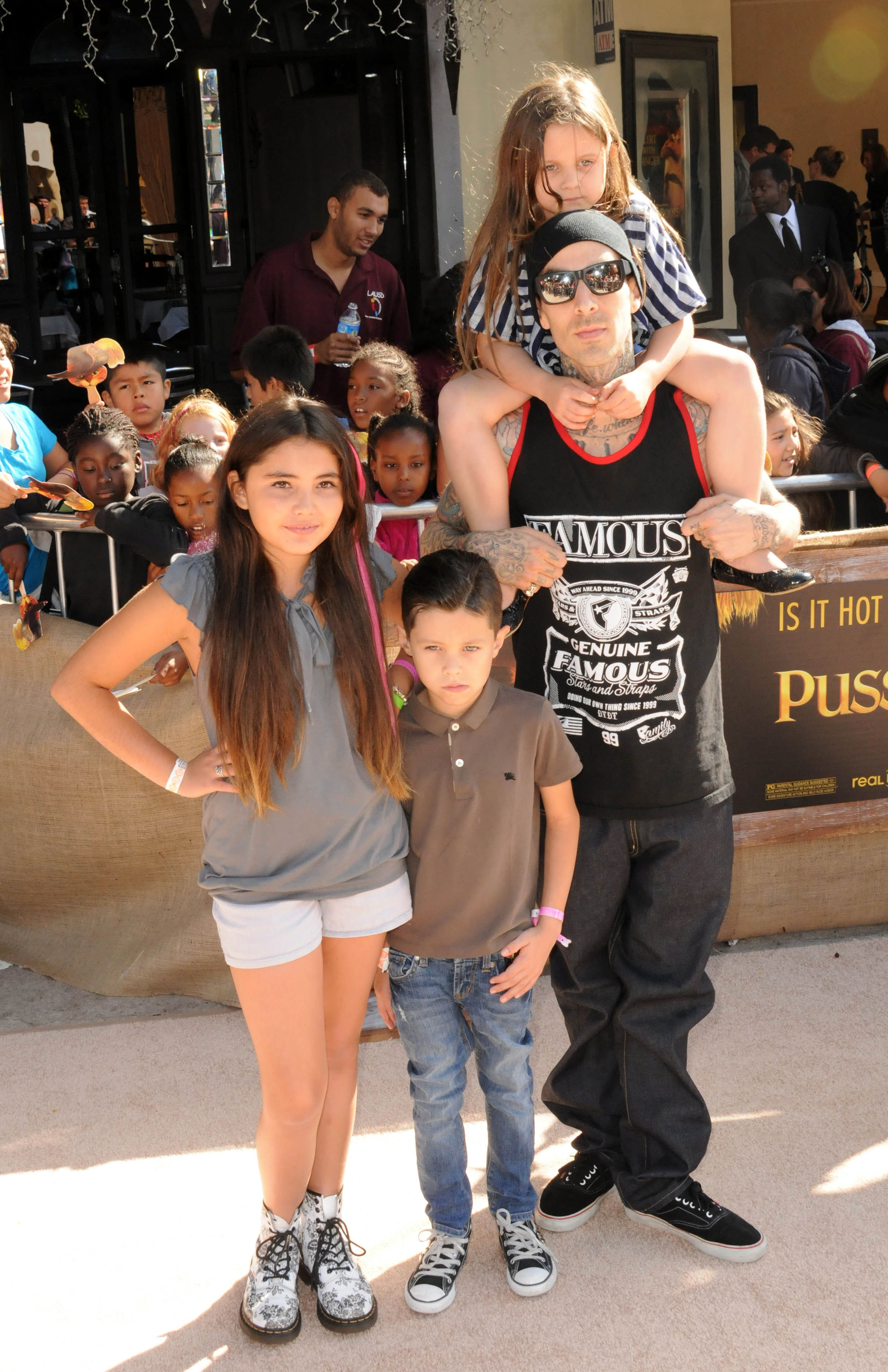 Travis Barker, daughter Alabama, son Landon and stepdaughter Atiana attend the "Puss In Boots" Los Angeles Premiere at Regency Village Theatre on October 23, 2011 in Westwood, California. | Source: Getty Images