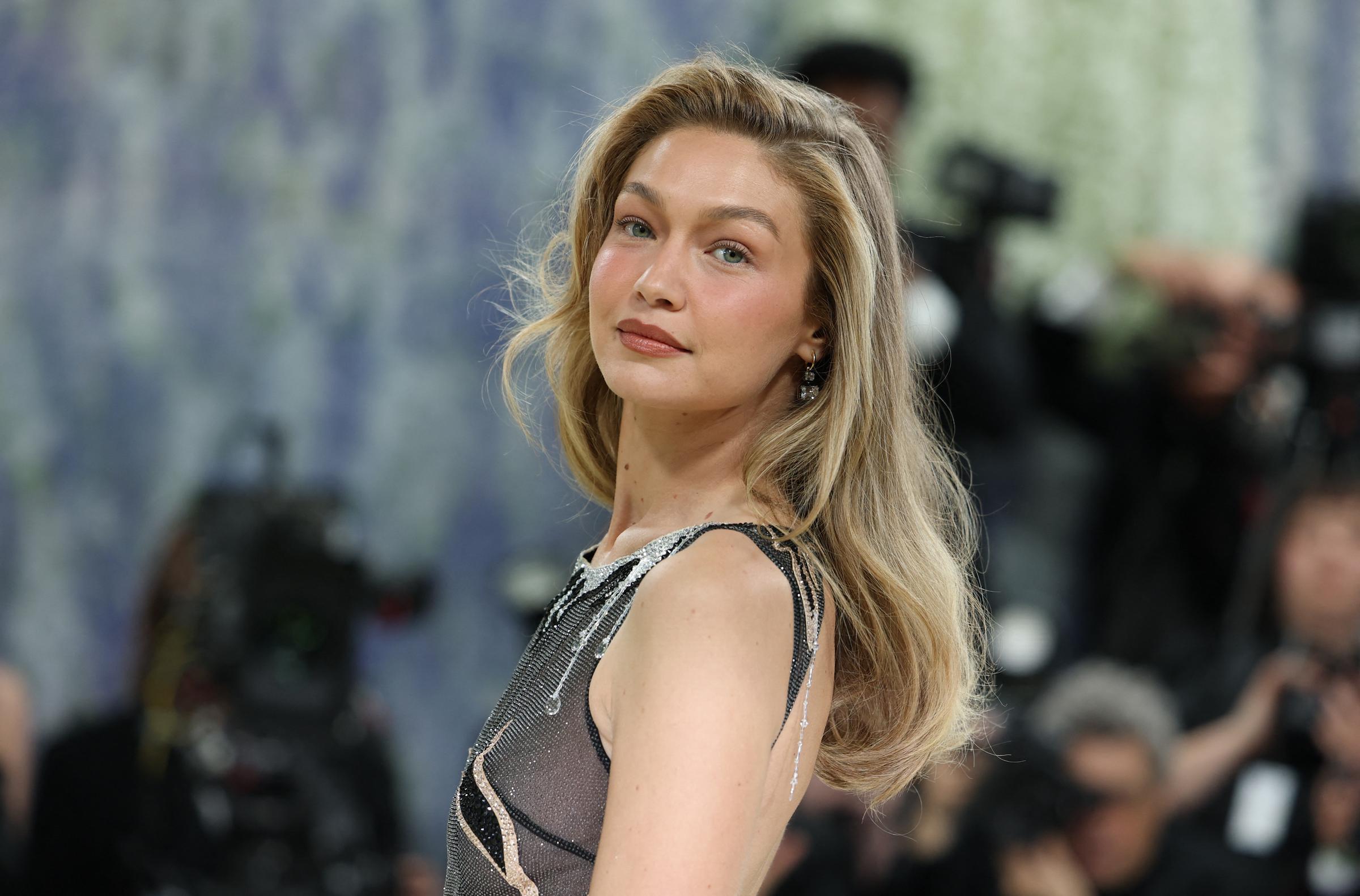 Gigi Hadid arrives for the Met Gala celebrating "Costume Art" at the Metropolitan Museum of Art, in New York, on May 4, 2026. | Source: Getty Images