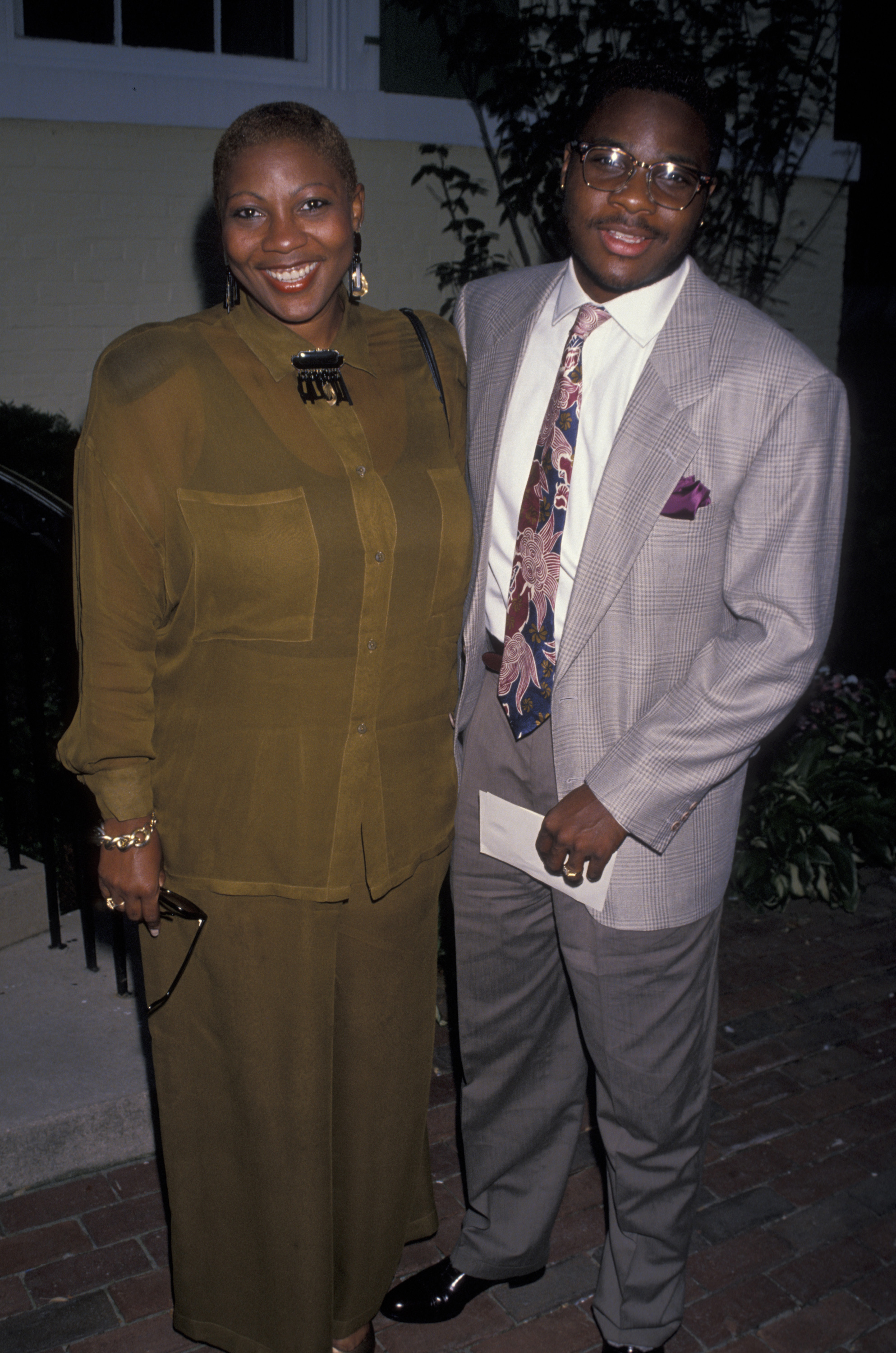 Malcolm-Jamal Warner and mother Pamela Warner attend the "Crystal Apple Awards Presentation" at the Gracie Mansion on July 30, 1990 in New York City | Source: Getty Images