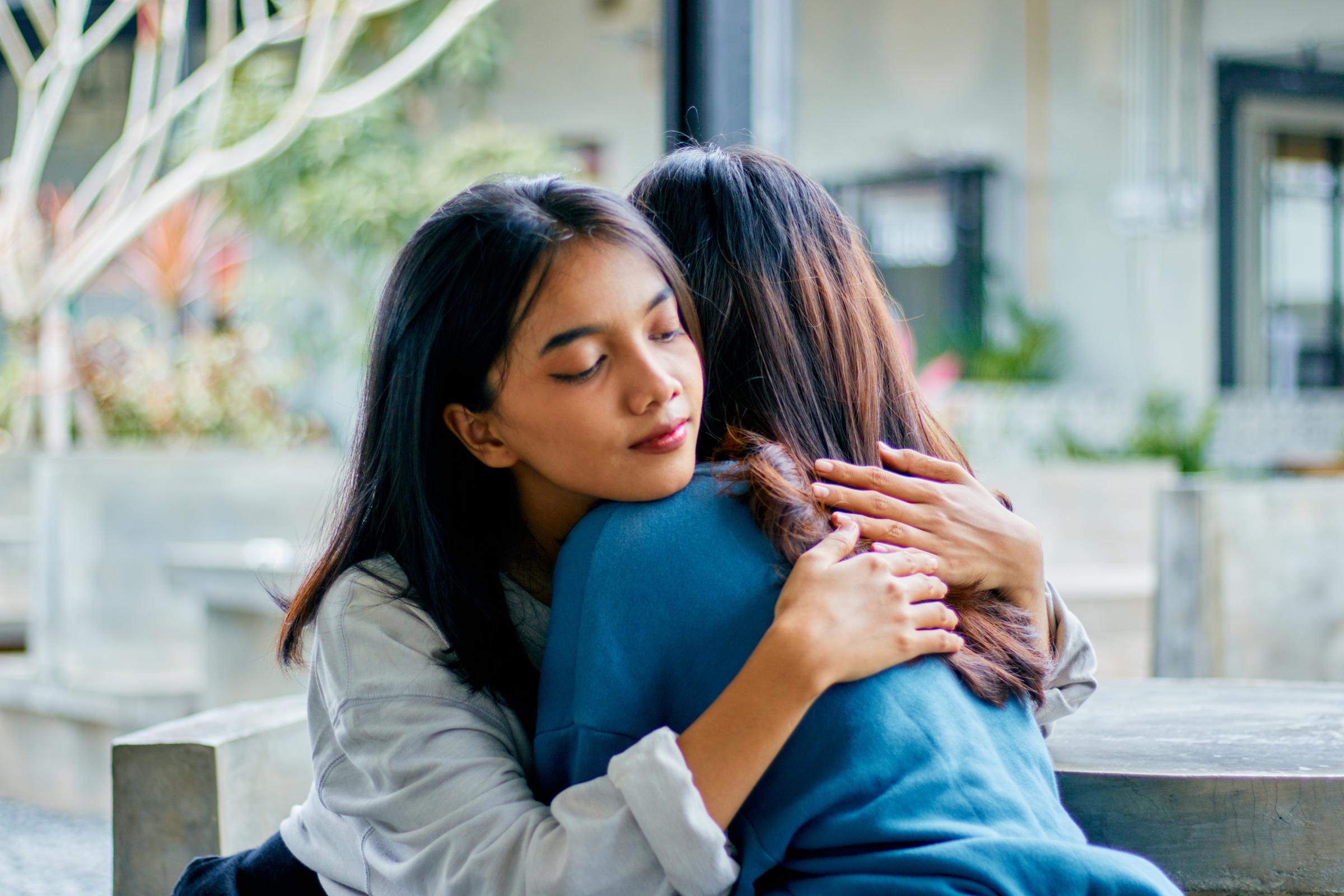 Two women embracing | Source: Getty Images