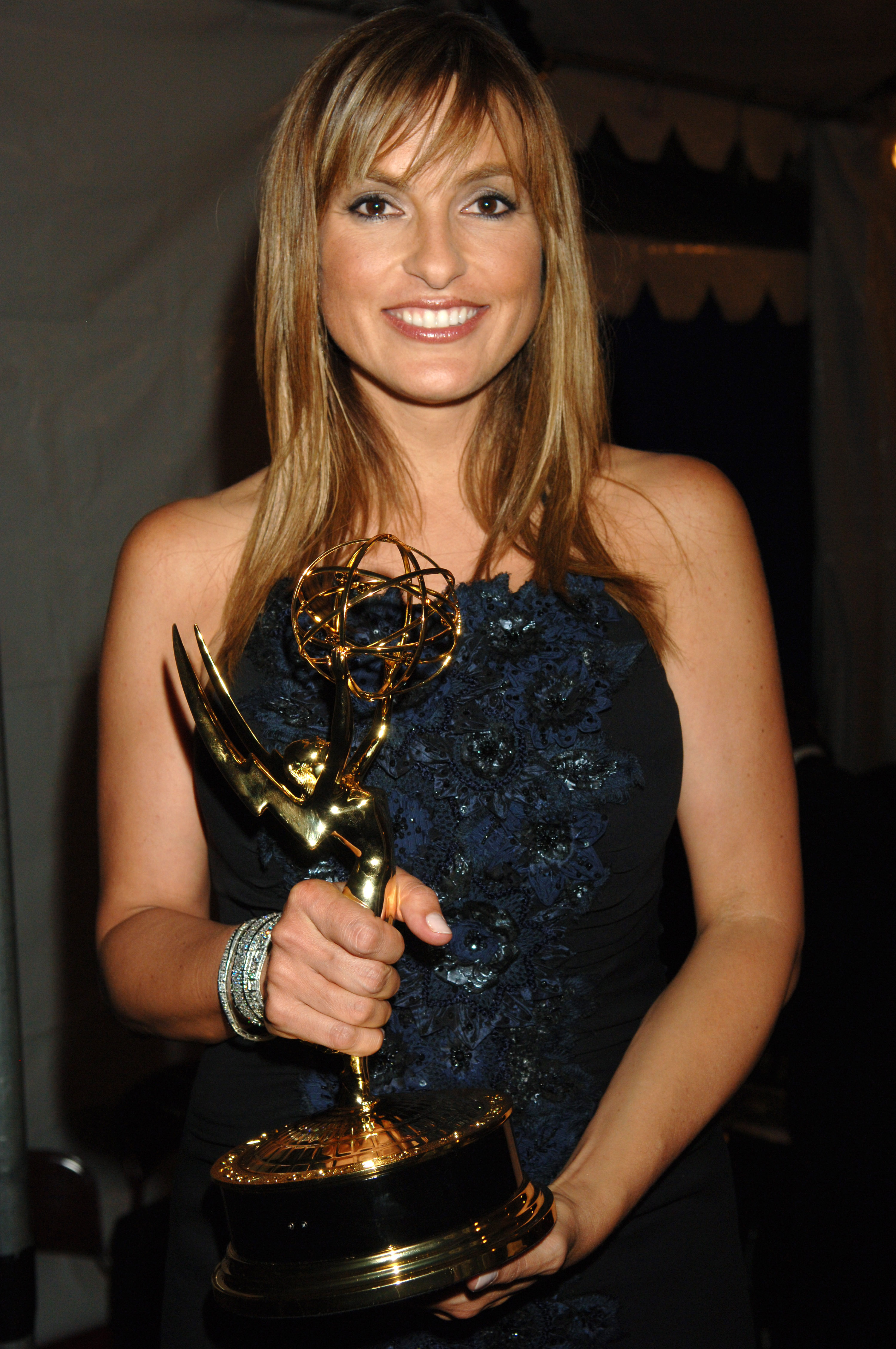 Mariska Hargitay, winner of Outstanding Lead Actress in a Drama Series for "Law & Order: Special Victims Unit," poses with her award at the 58th Annual Primetime Emmy Awards on August 27, 2006. | Source: Getty Images