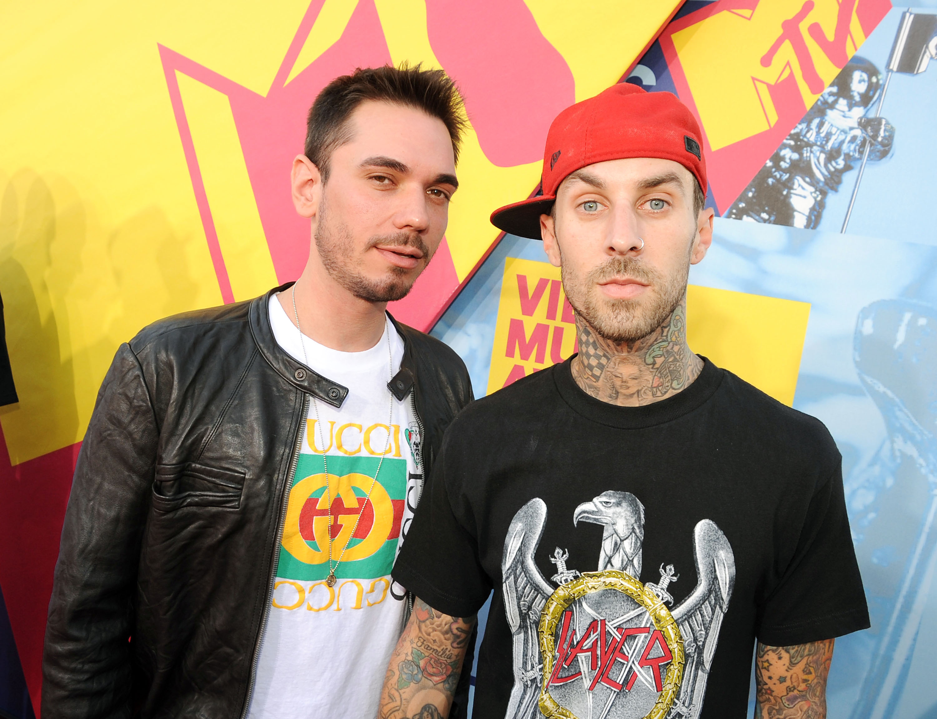 DJ AM and musician Travis Barker arrive at the 2008 MTV Video Music Awards at Paramount Pictures Studios on September 7 in Los Angeles, California. | Source: Getty Images