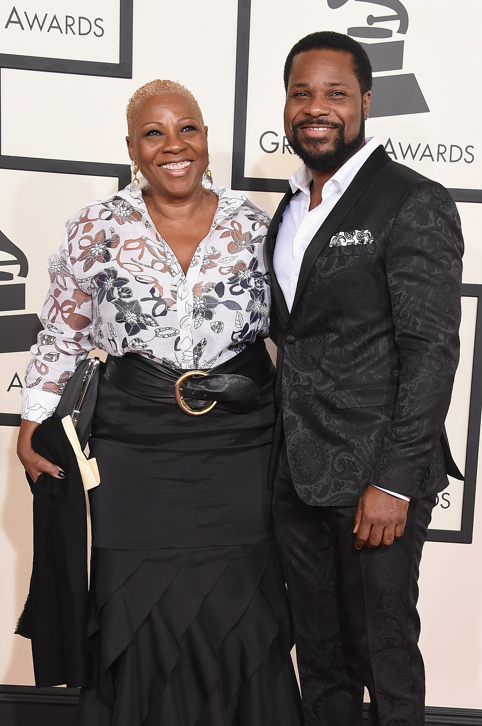 Malcolm-Jamal Warner (R) and Pamela Warner attend The 57th Annual GRAMMY Awards at the STAPLES Center on February 8, 2015 in Los Angeles, California. | Source: Getty Images