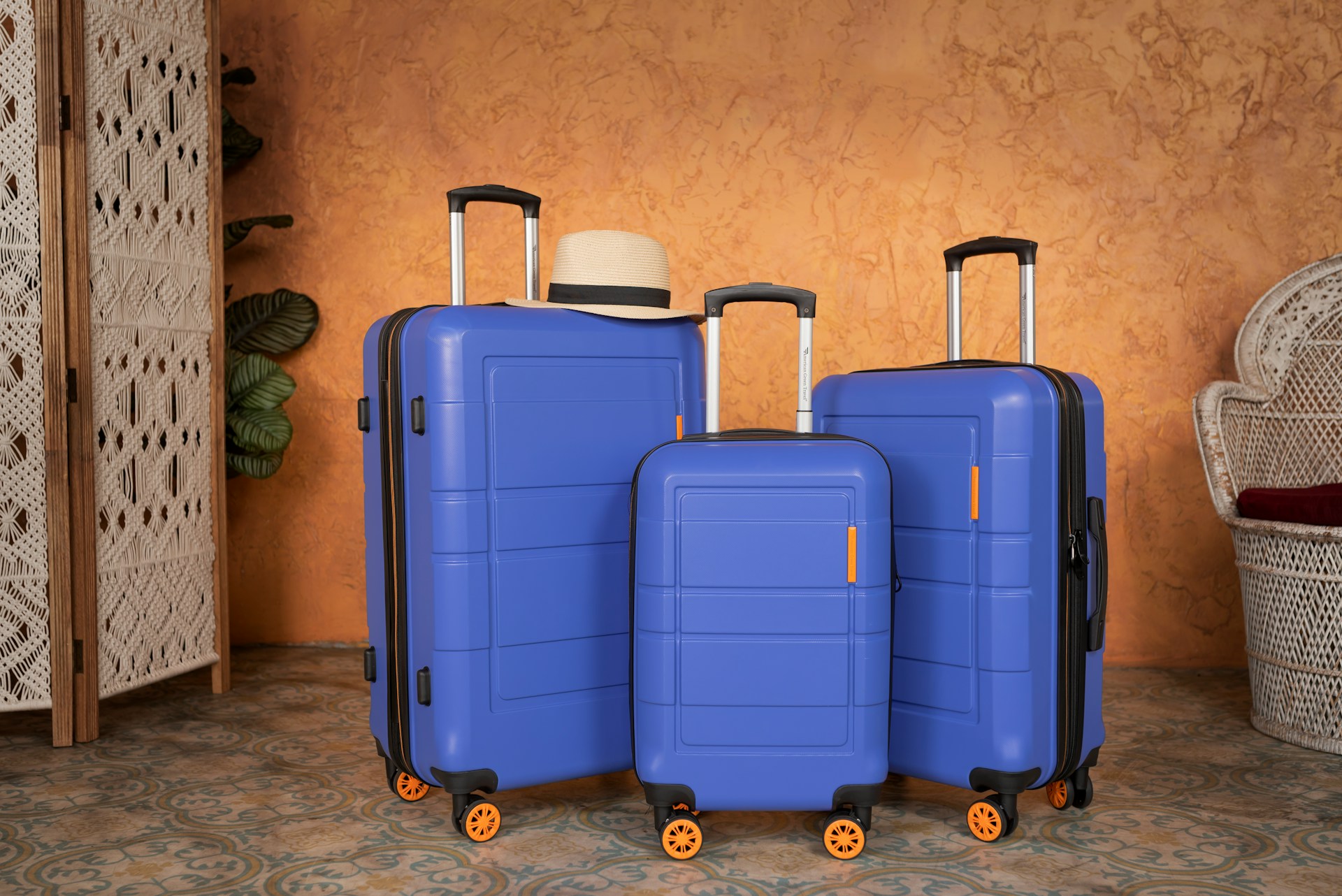 Three suitcases in a room | Source: Unsplash