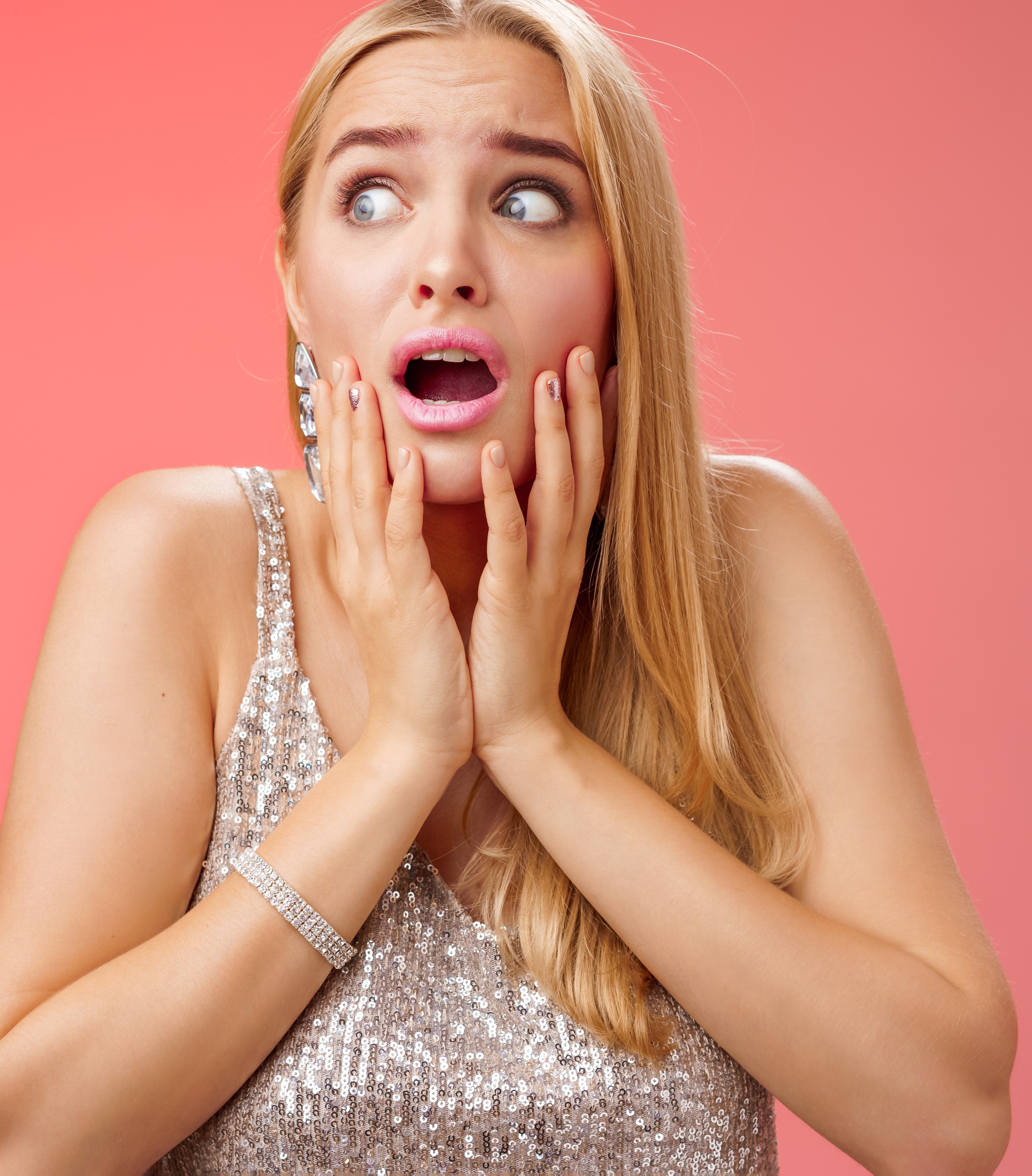 A startled woman | Source: Freepik