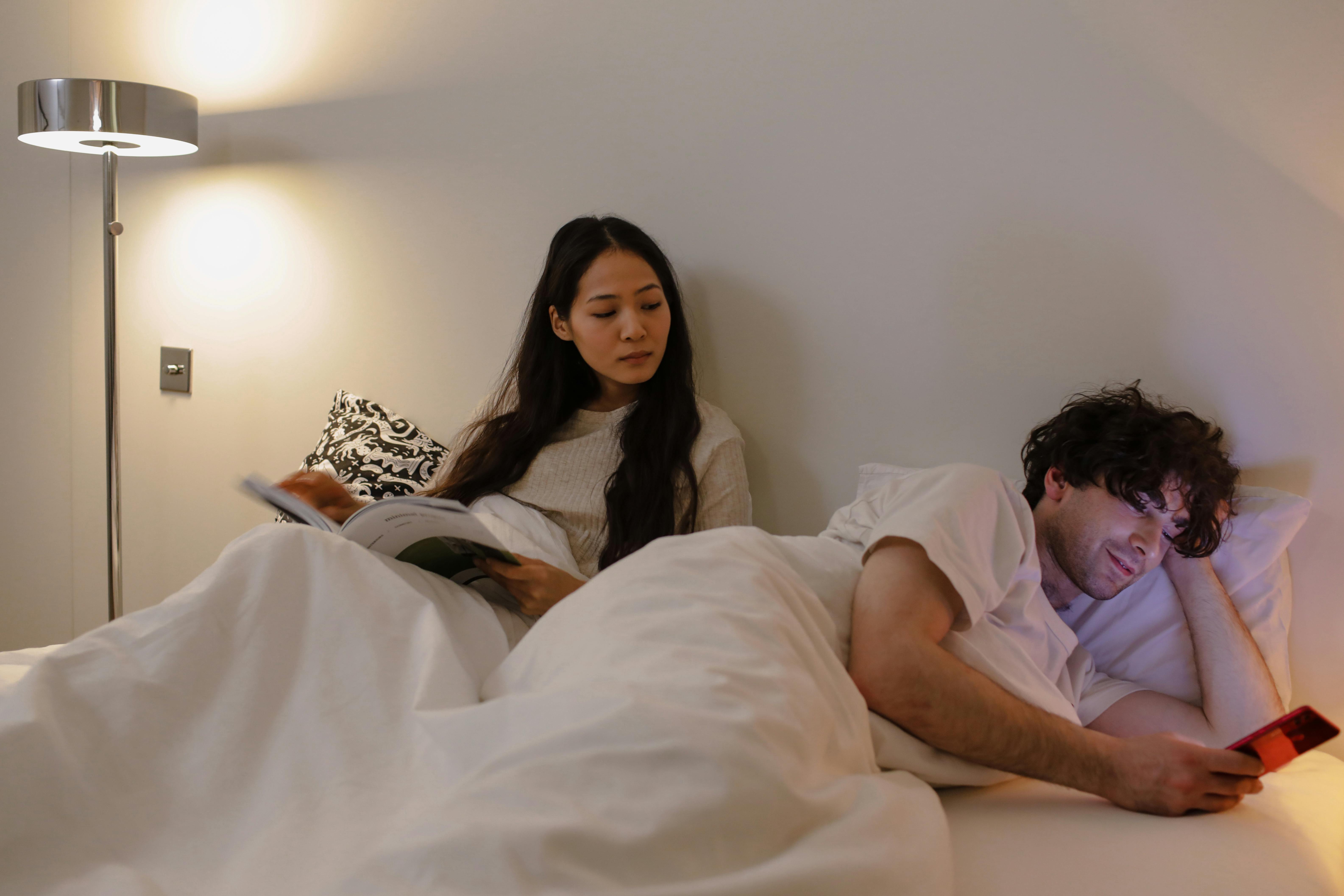 Couple in bed | Source: Pexels