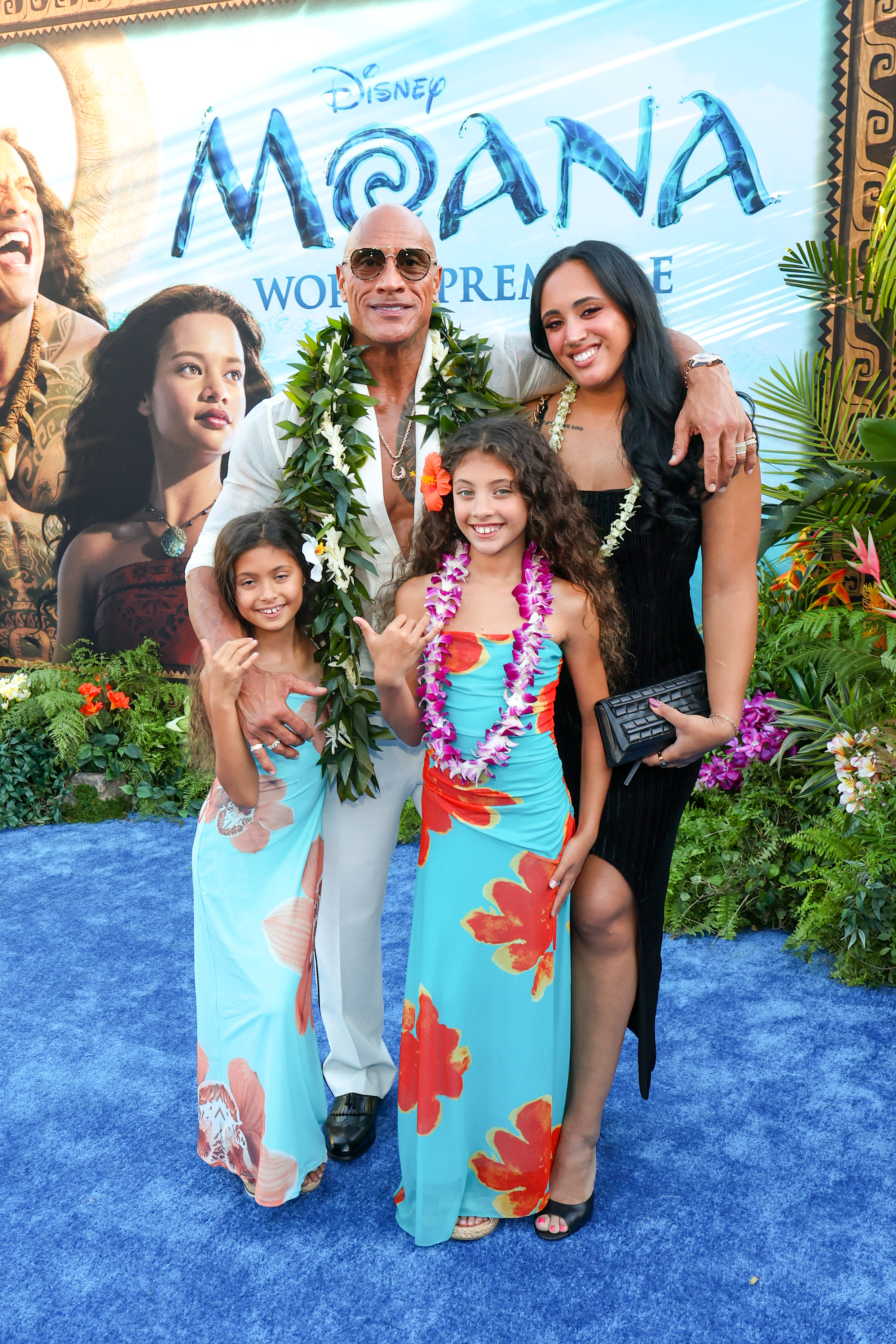 Tiana Johnson, Dwayne Johnson, Jasmine Johnson and Ava Raine (Simone Johnson) attend the "Moana" World Premiere at the Hollywood Bowl on July 7, 2026 in Los Angeles, California. | Source: Getty Images