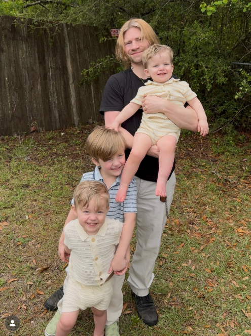 Bear Brown with his three kids in a garden on April 5, 2026 | Source: Instagram/bearbrownthekingofextreme