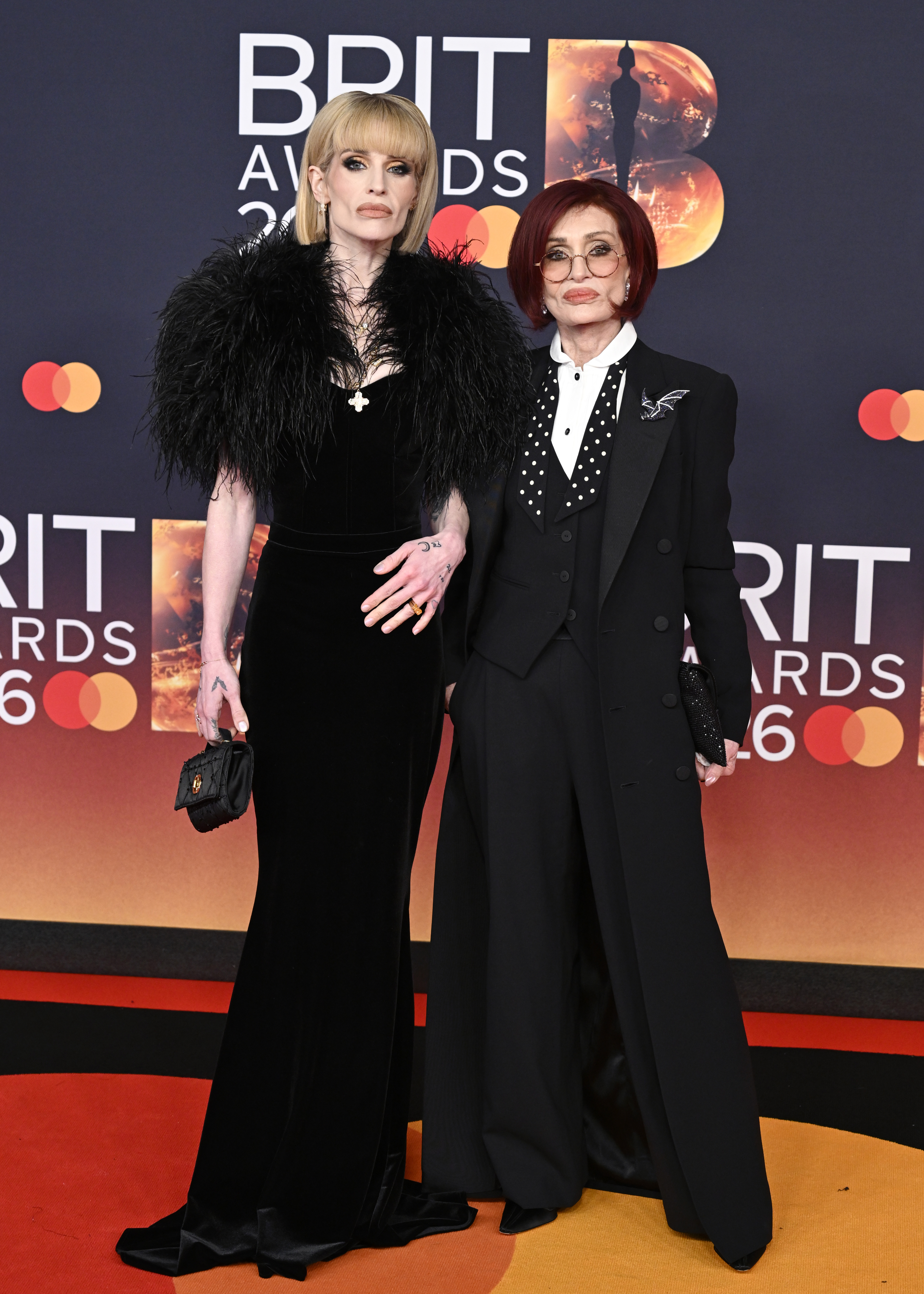 Kelly Osbourne and Sharon Osbourne attend The BRIT Awards 2026 at Co-op Live on February 28, 2026 in Manchester, England. | Source: Getty Images