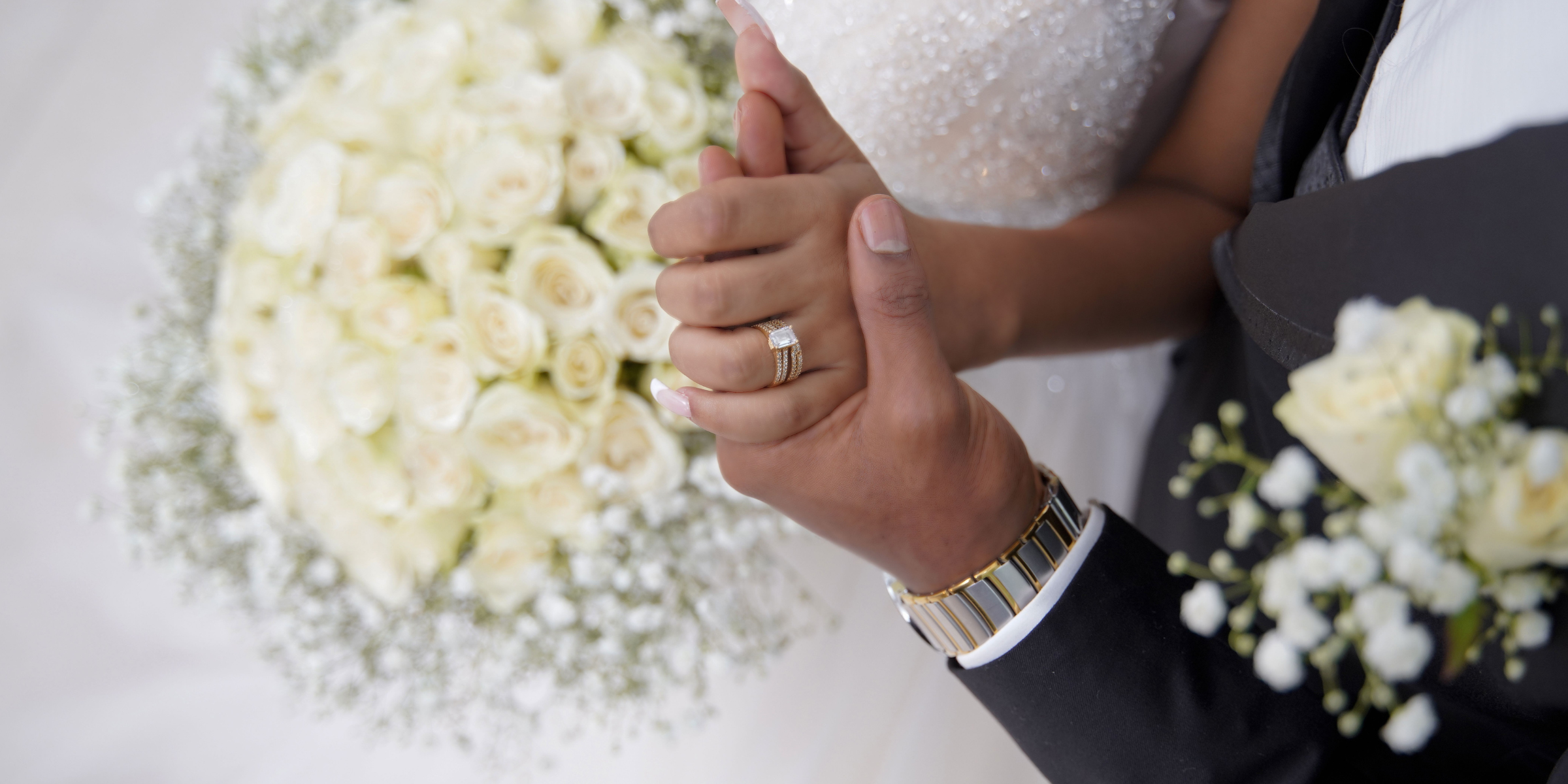 A bride and groom holding hands | Source: Pexels