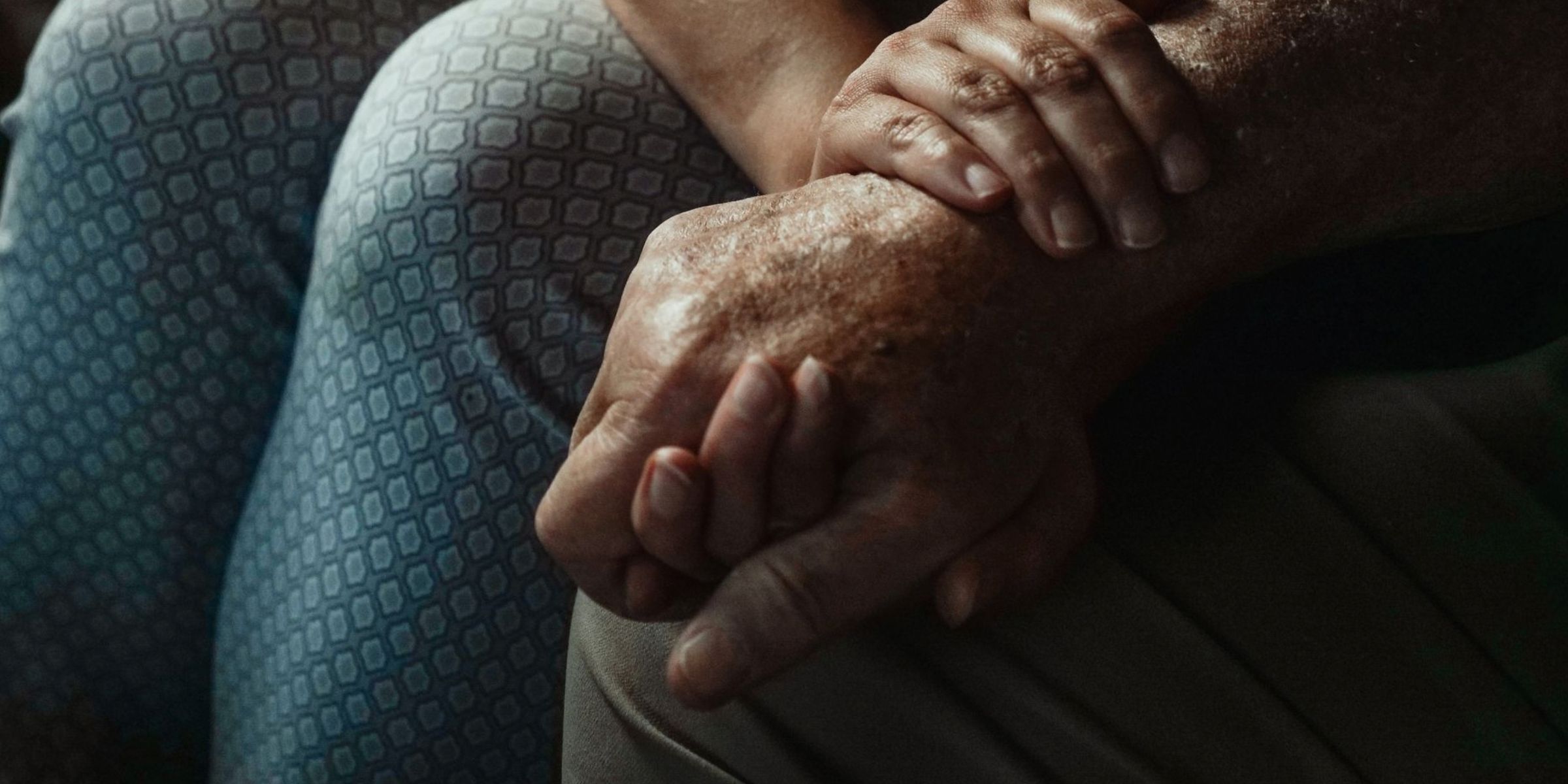 Close-up of hands conveying support and compassion during an intimate moment | Source: Pexels