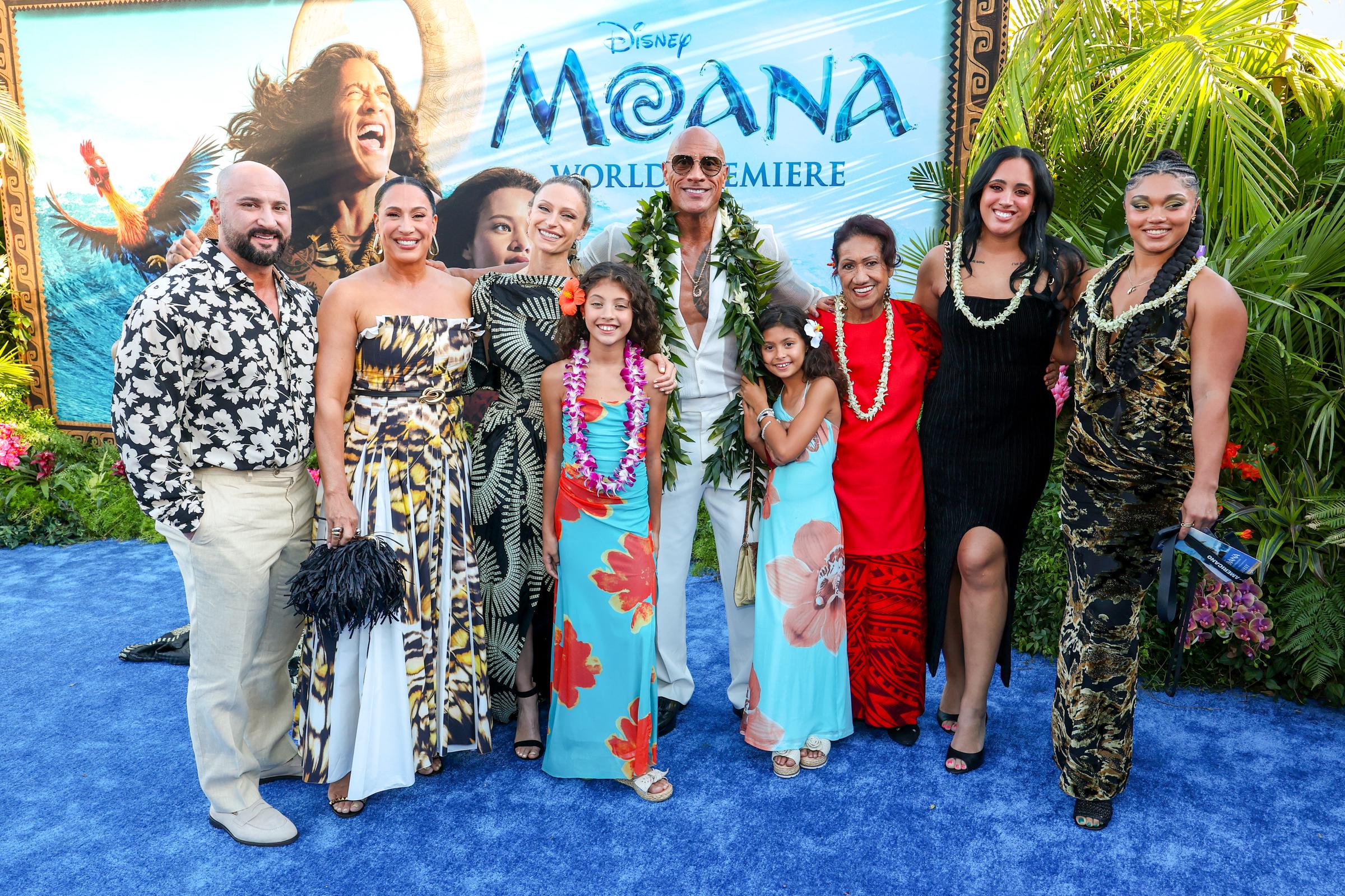 (L-R) Dave Rienzi, Dany Garcia, Lauren Hashian, Jasmine Johnson, Dwayne Johnson, Tiana Johnson, Ata Johnson, Ava Raine (Simone Johnson) and Tatyanna Dumas attend the "Moana" World Premiere at Hollywood Bowl on July 7, 2026 in Los Angeles, California. | Source: Getty Images